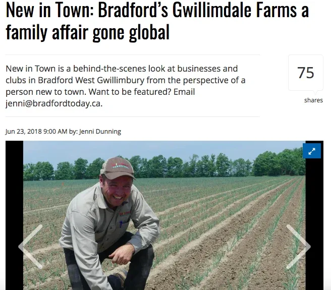Screenshot of the above linked article. Headline reads "New in Town: Bradford's Gwillimdale Farms a family affair gone global" followed by the text "New in Town is a behind-the-scenes look at businesses and clubs in Bradford West Gwillimbury from the perspective of a person new to town. Want to be featured? Email jenni@bradfordtoday." At the bottom is a photo of John Sr., one of the owners of Gwillimdale Farms, kneeling in one of Gwillimdale's fields.