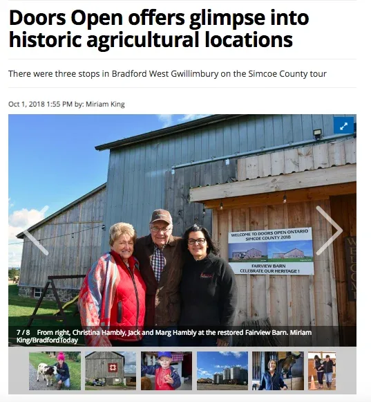 Screenshot from the above linked article. The headline reads "Doors Open offers glimpse into historic agricultural locations" followed by the subheading "There were three stops in Bradford West Gwillimbury on the Simcoe County tour"

Below the title is a slideshow, a photo of three people posing in front of a barn. The caption reads "From right, Christina Hambly, Jack and Marg Hambly at the restored Fairview Barn. Miriam King/BradfordToday"