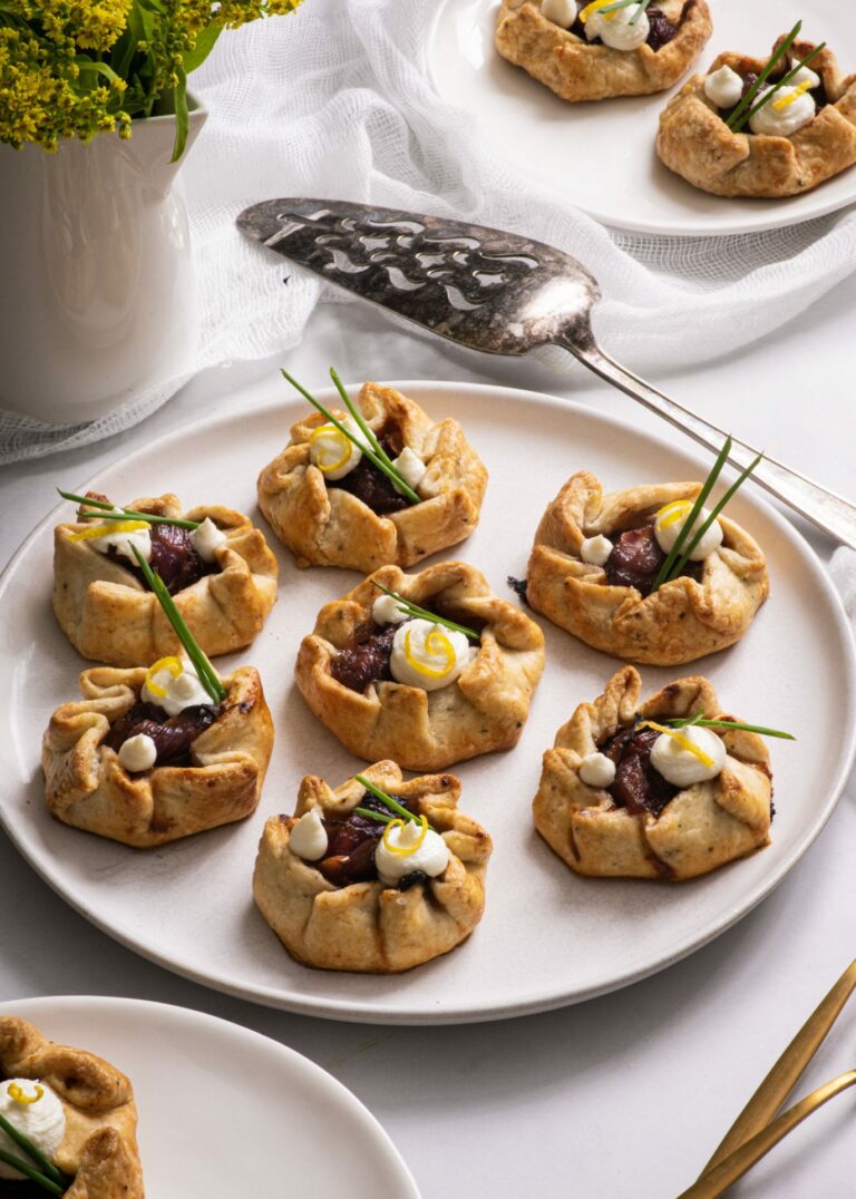 Seven Galettes with arranged on a round white serving dish.
