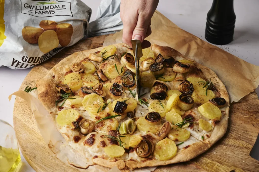 White Pizza with Rosemary Potatoes and Caramelized Leeks 1 Potato Pizza 12